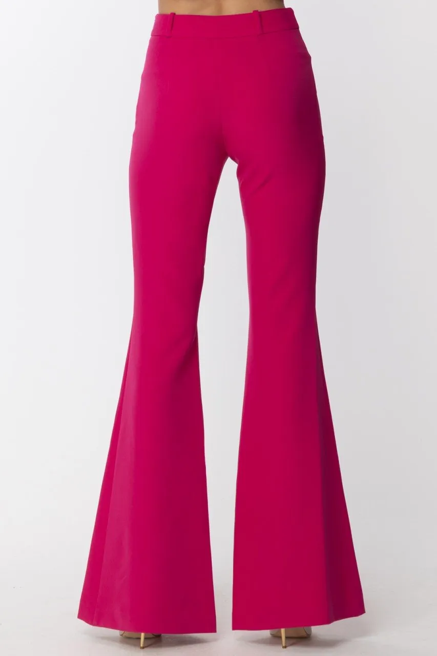 Pantalone a zampa con ciondolo logato Fucsia