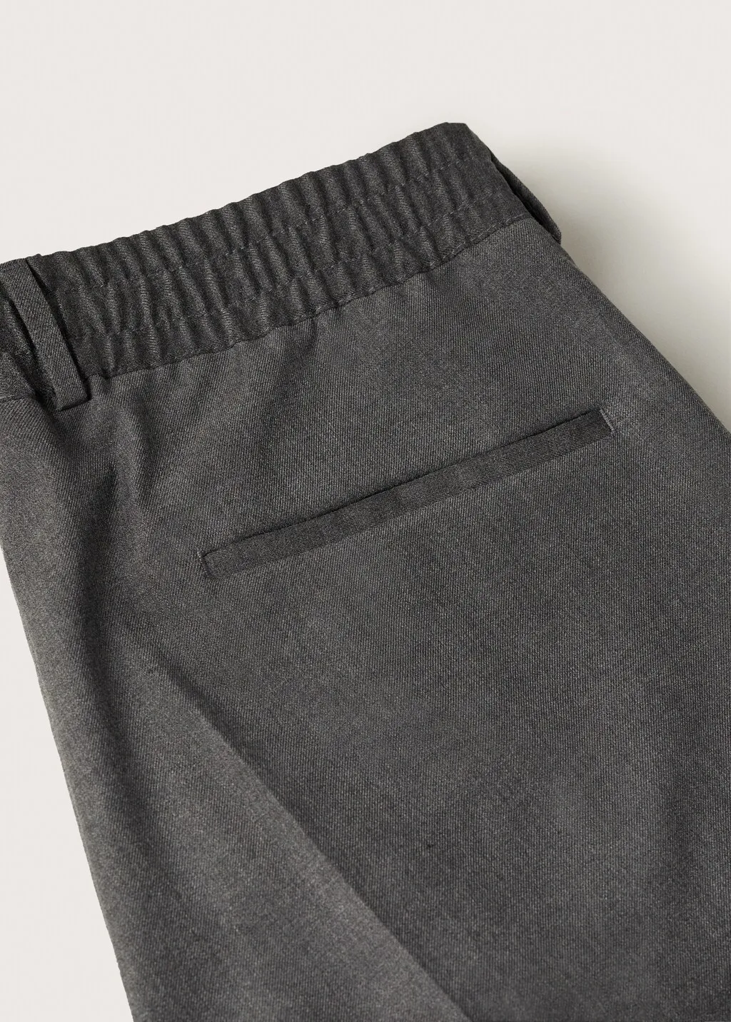 Pantaloni completo slim fit vita elasticizzata